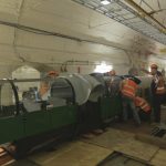 Carriage being installed on tracks underground at the Postal Museum